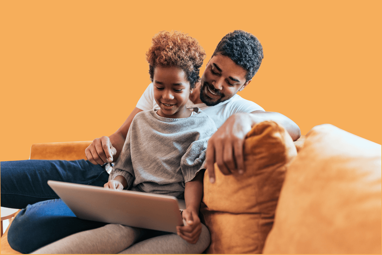 dad and son on laptop masked