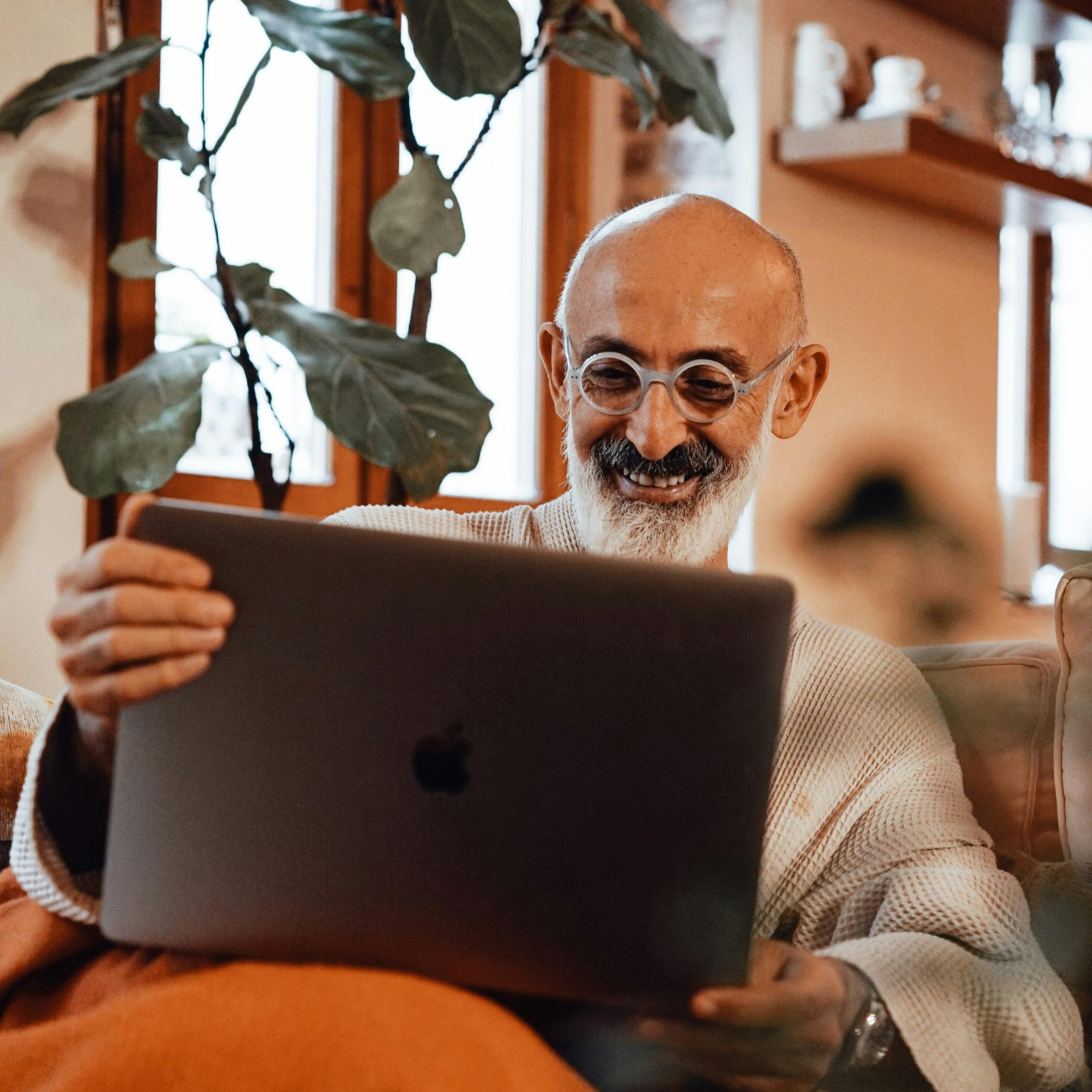Smiling Psychiatrist with Laptop
